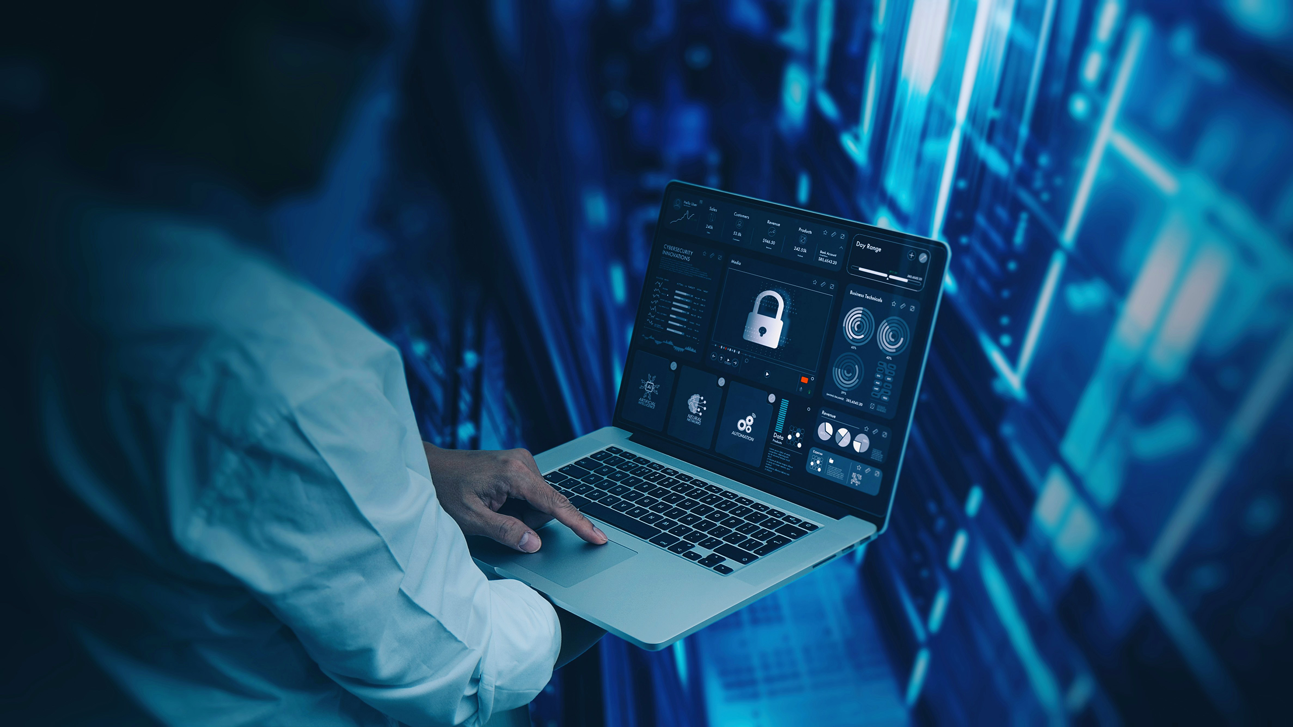 Photo of a person looking at cybersecurity measures on a laptop