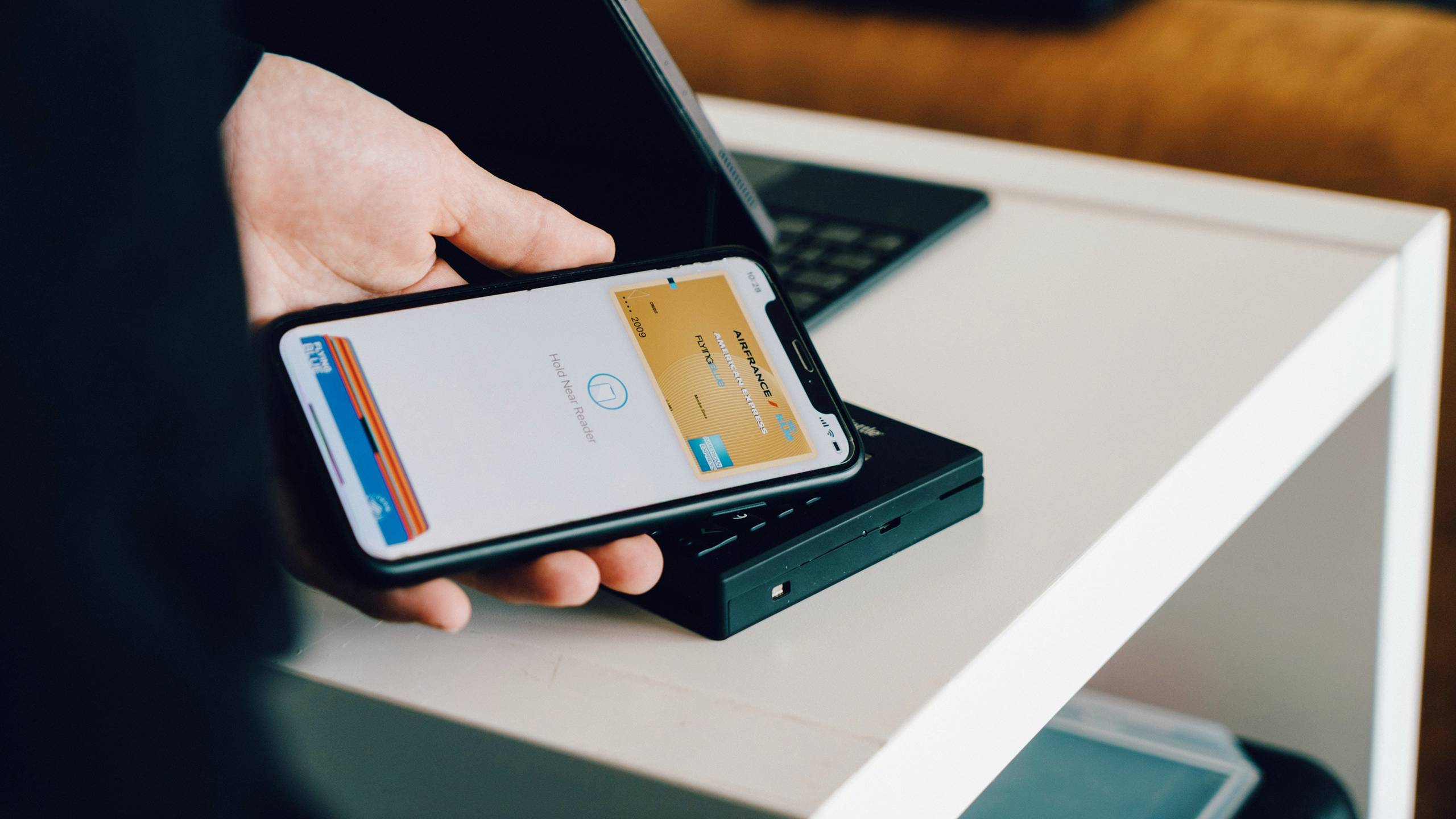 Photo of an American Express credit card using Apple Pay