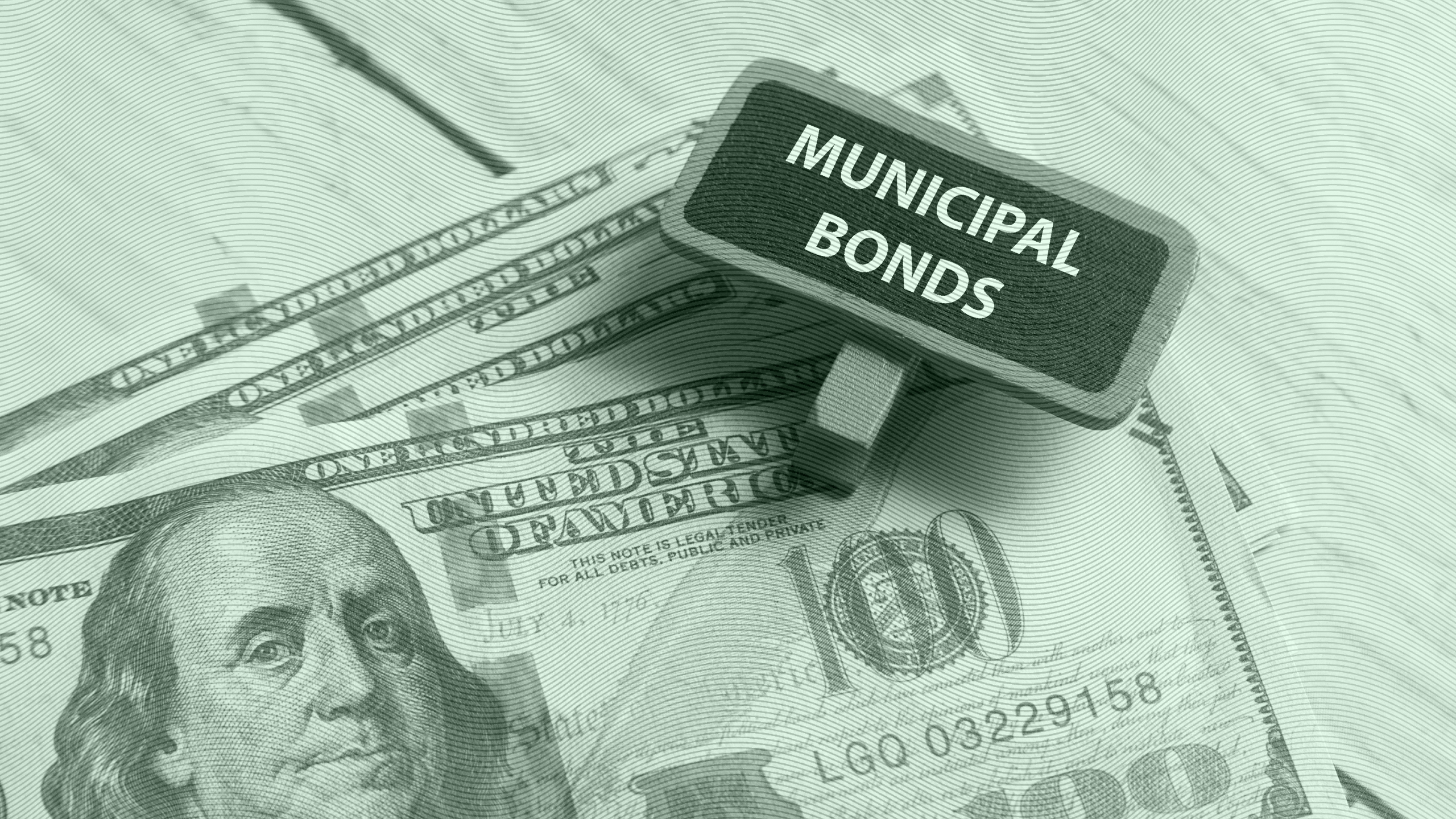 Photo of money with a sign that says "municipal bonds"