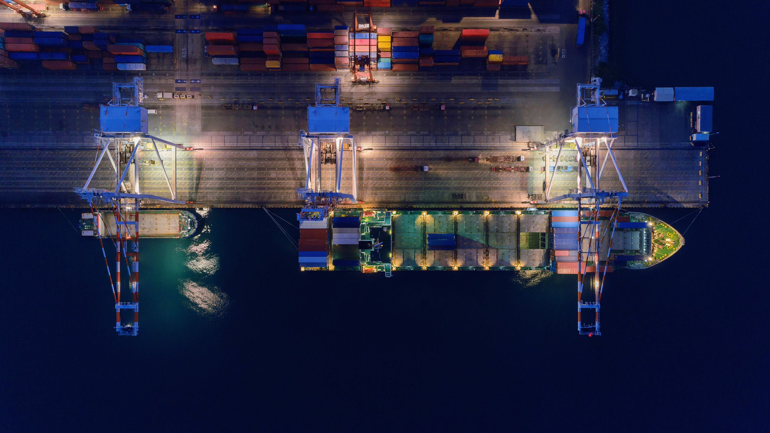 Photo of a shipping port at night
