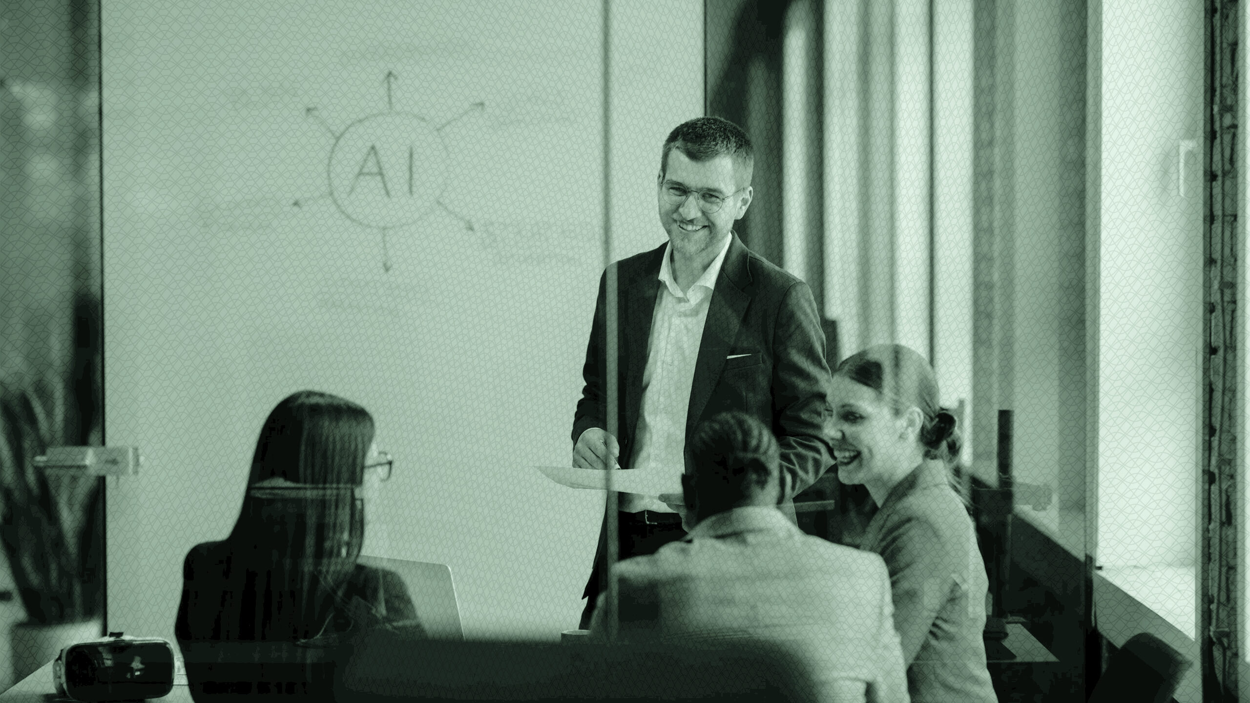 A group of people in a business meeting.