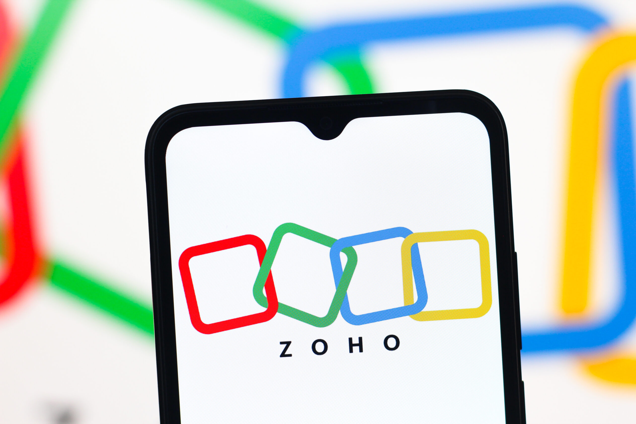 In this photo illustration, the Zoho Corporation logo is seen displayed on a smartphone screen. (Photo by Thomas Fuller / SOPA Images/Sipa USA) *** Strictly for editorial news purposes only *** (Newscom TagID: sipaphotostwentytwo000199.jpg) [Photo via Newscom]