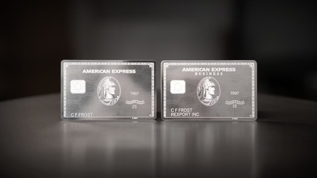 A sample of an American Express US Consumer card is shown next to one of the company's Business Platinum cards.
