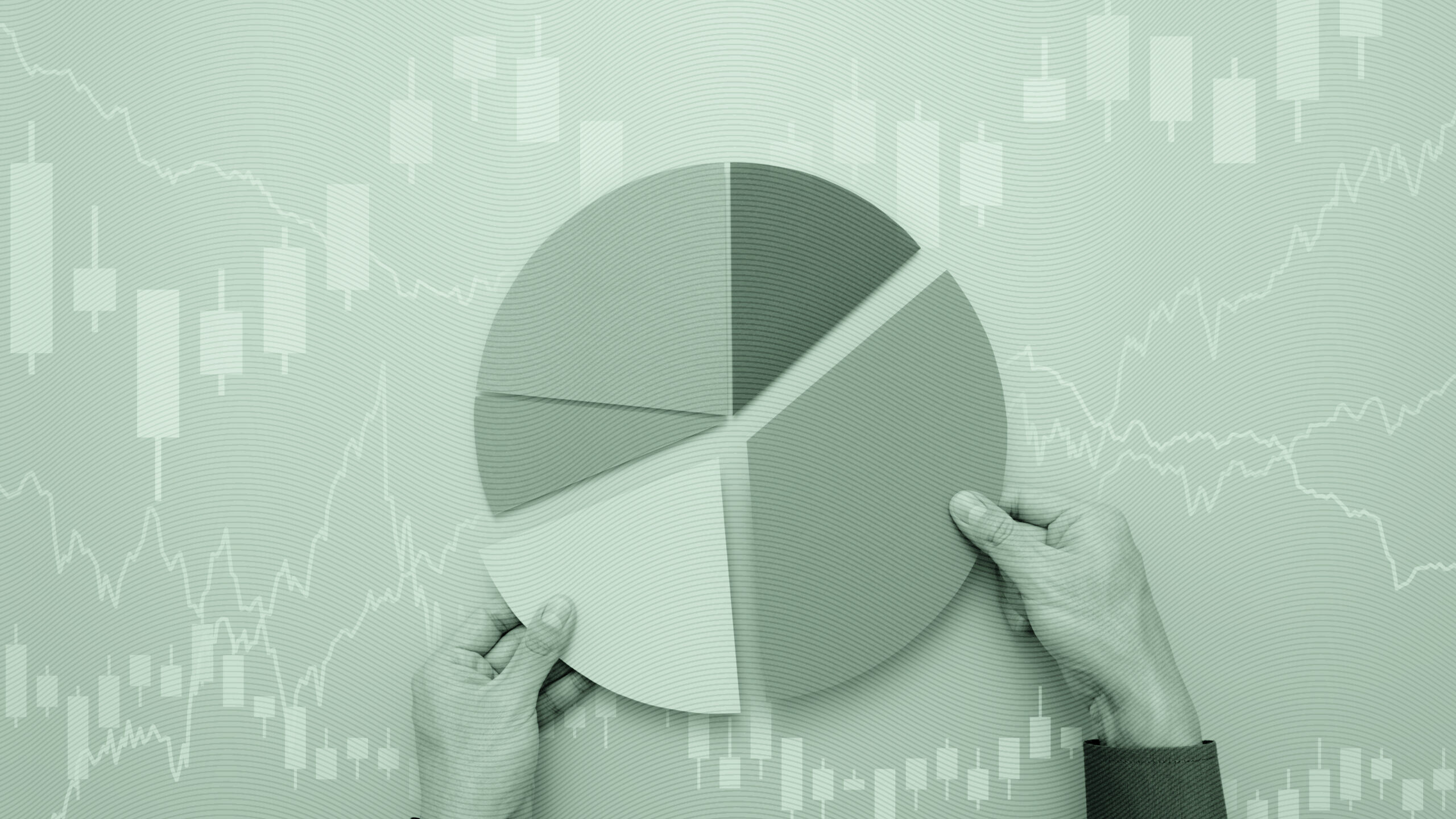 Photo of hands piecing together a pie chart