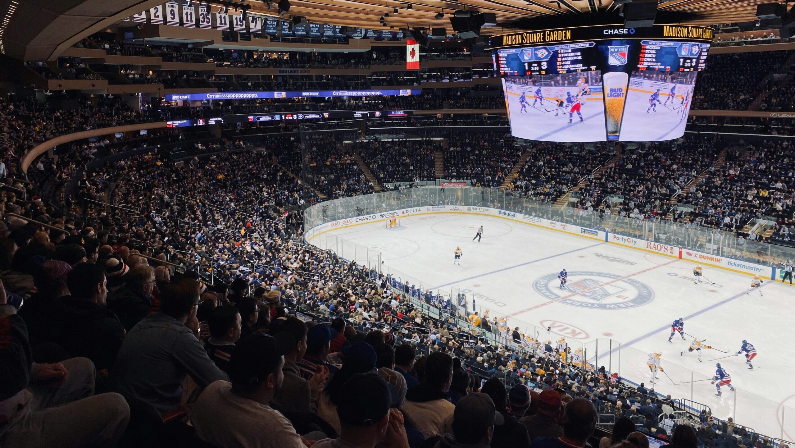 A view from inside New York City's Madison Square Garden shows the NHL's New York Rangers facing off against the Nashville Predators in an ice hockey game.