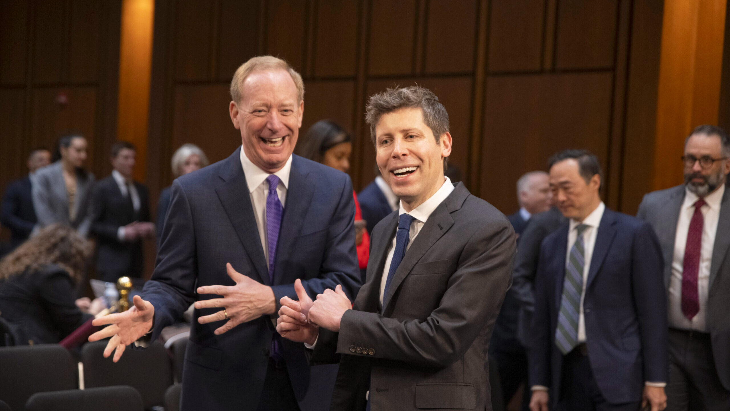 Photo of OpenAI CEO Sam Altman and Microsoft Vice Chair and President Brad Smith.