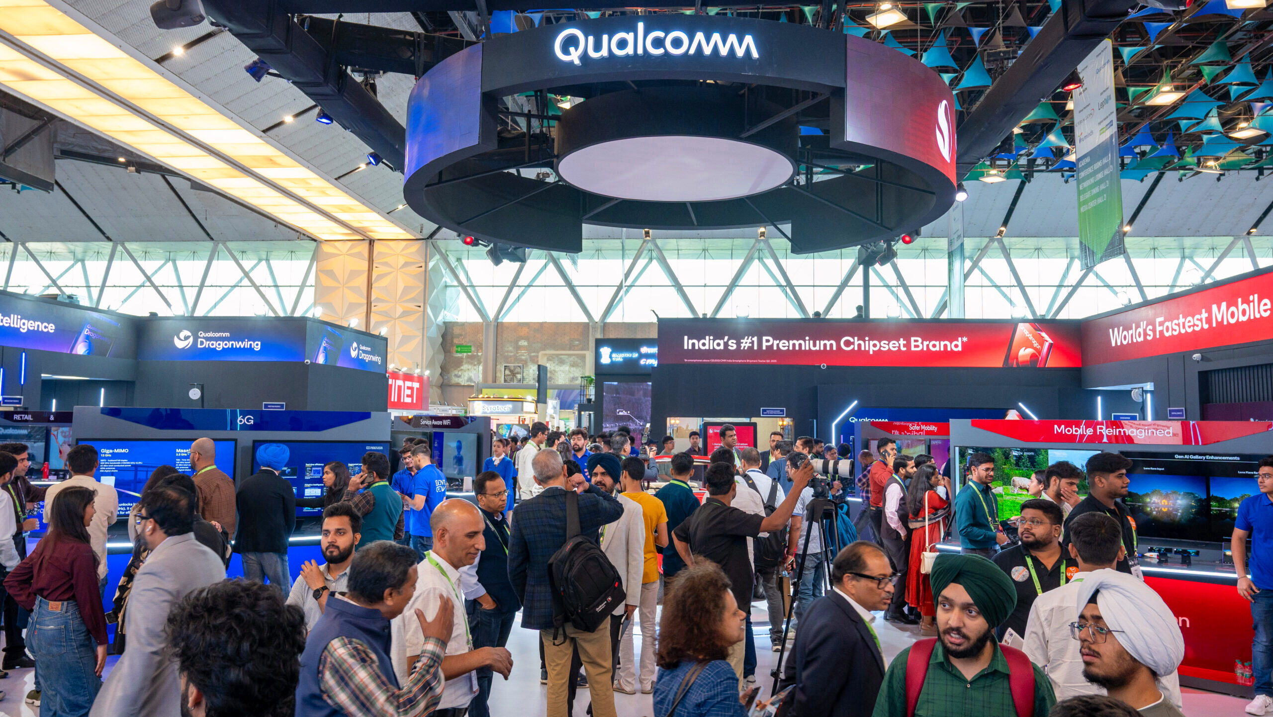 Photo of a Qualcomm booth at a tech conference.