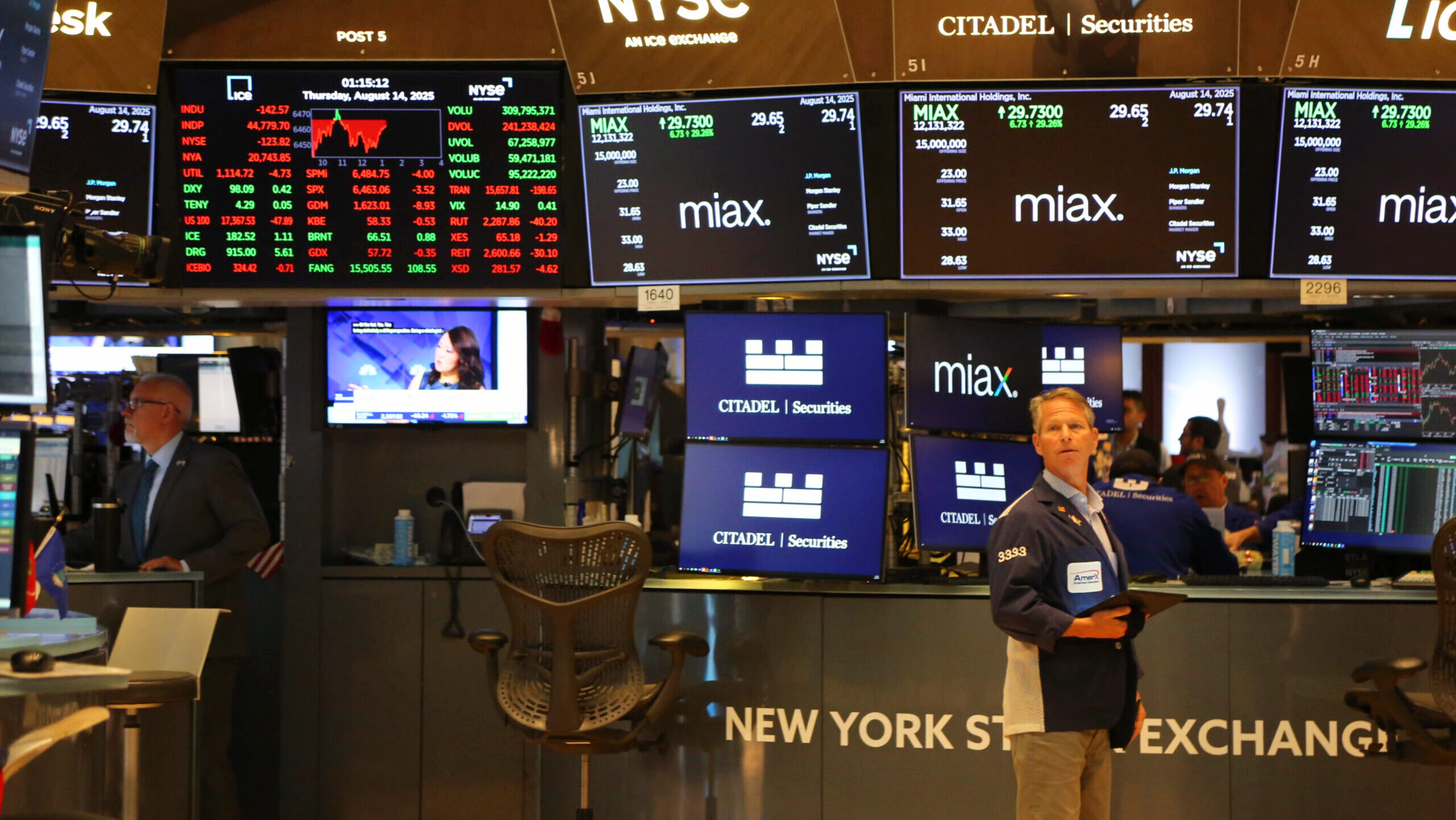 Photo of traders on the floor of the New York Stock Exchange.
