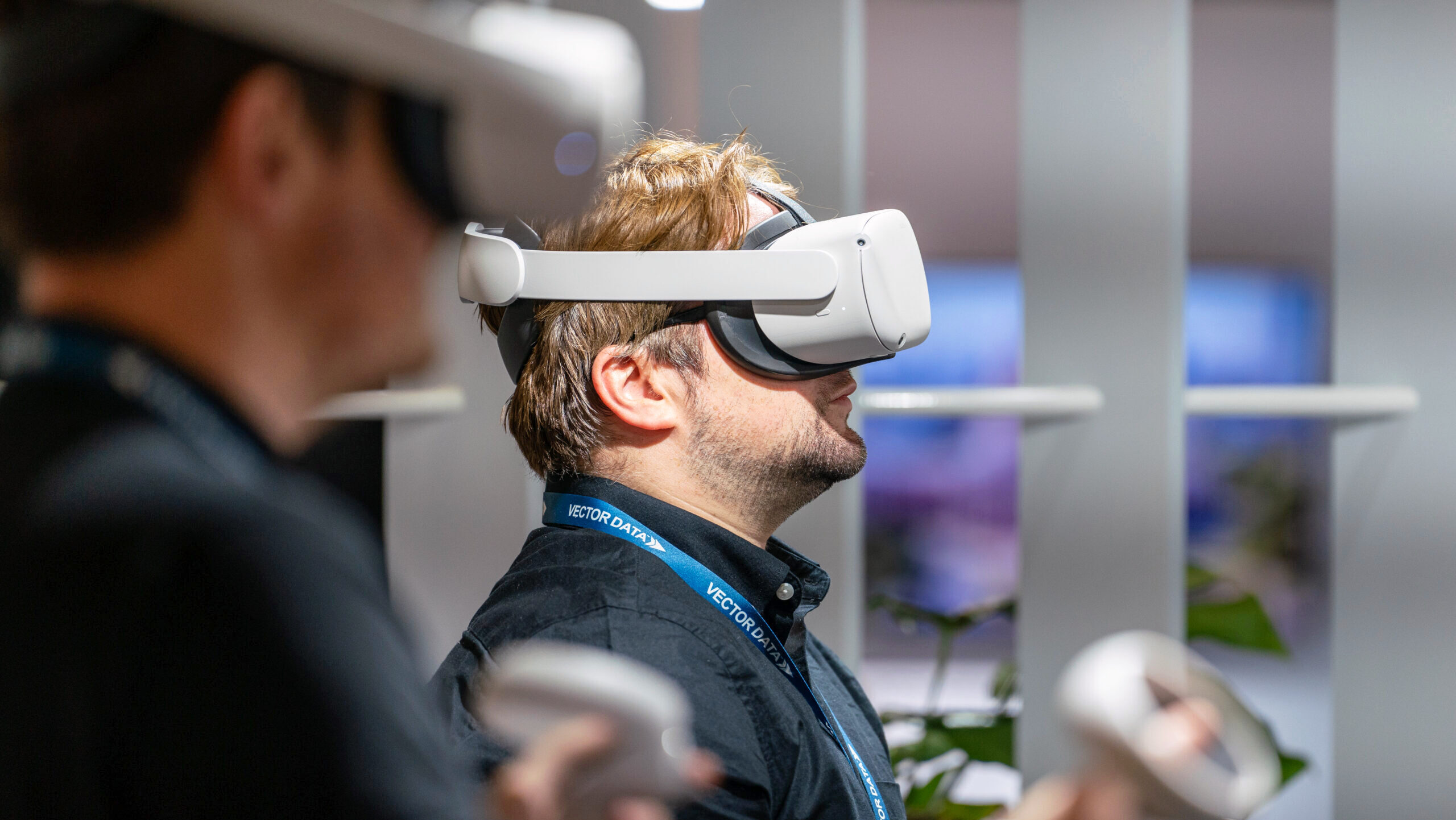 Photo of a man wearing a Meta Oculus VR headset.