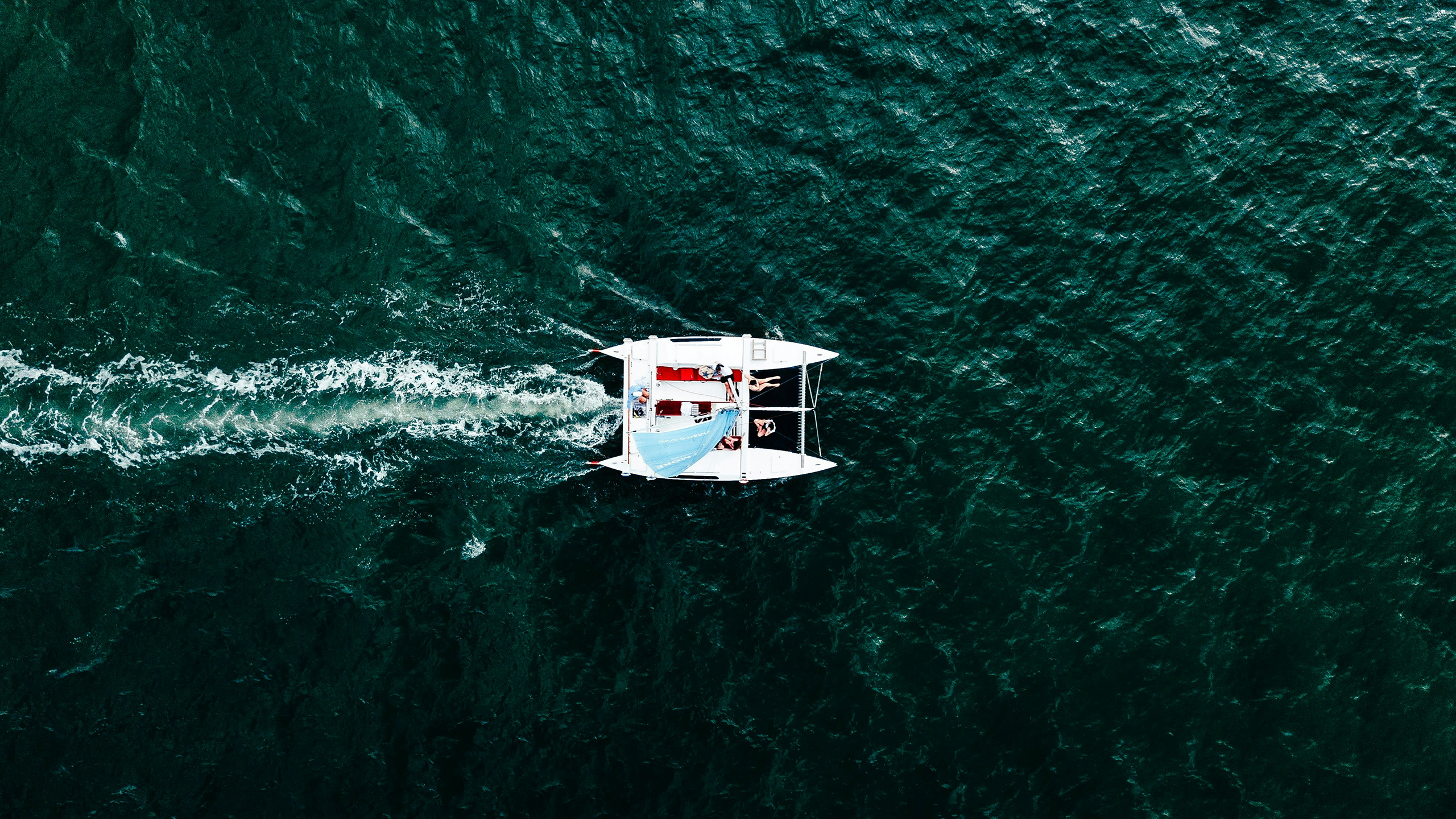 Aerial photo of people on a boat