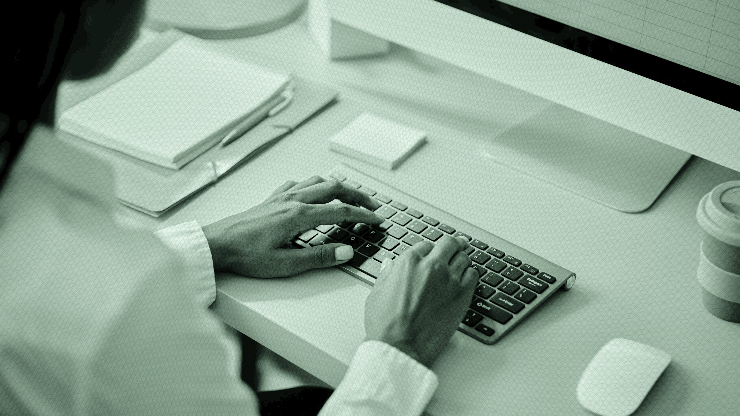 A woman using a computer.
