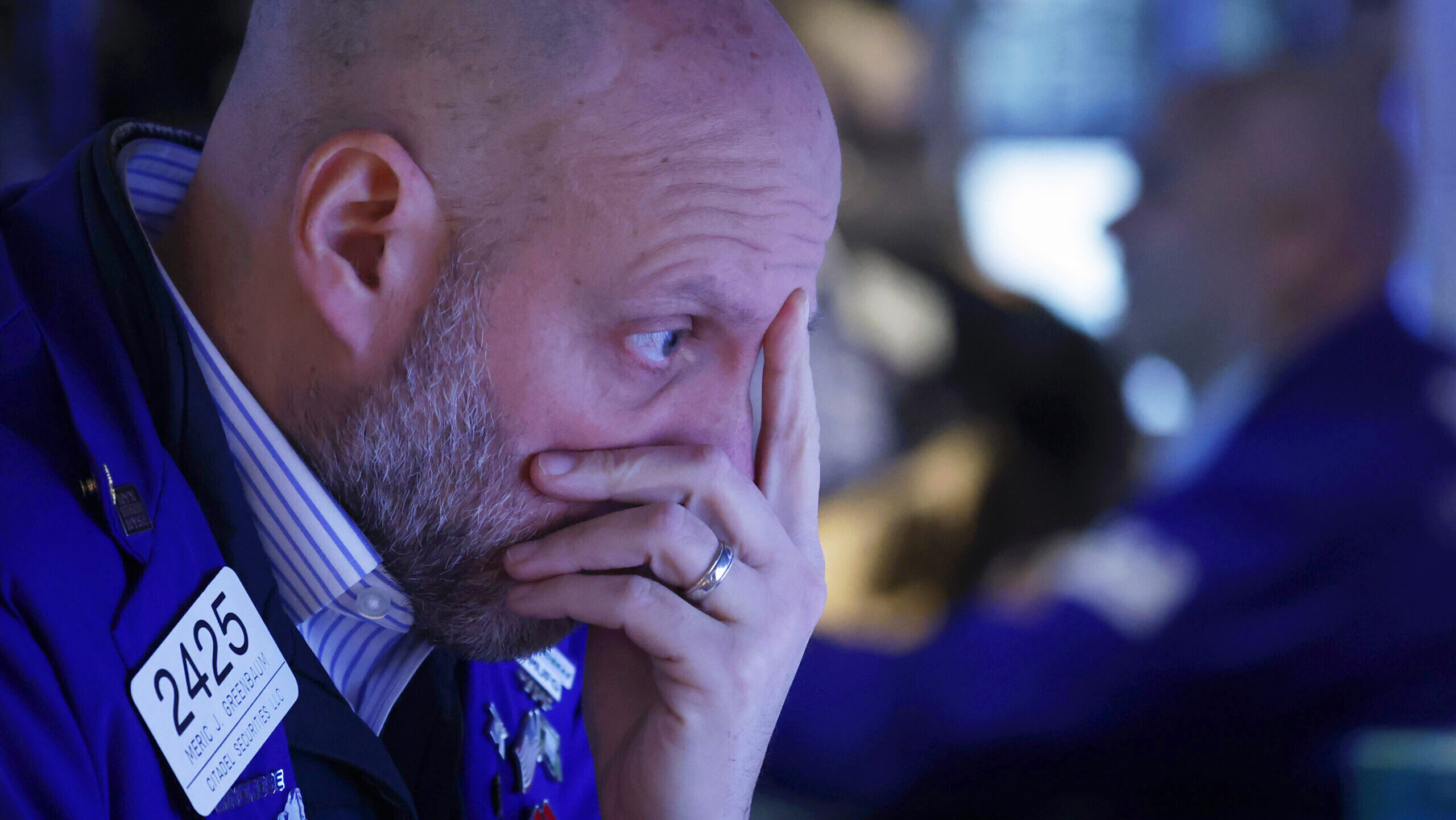 Photo of a trader on the floor of the New York Stock Exchange.