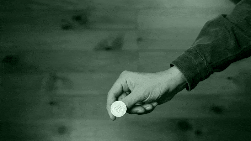 GIF of flipping a silver coin