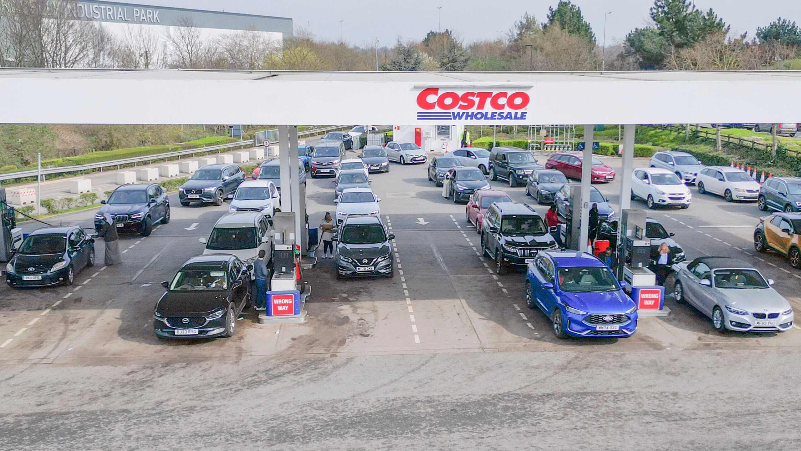 Photo of a line of cars at a Costco gas station.