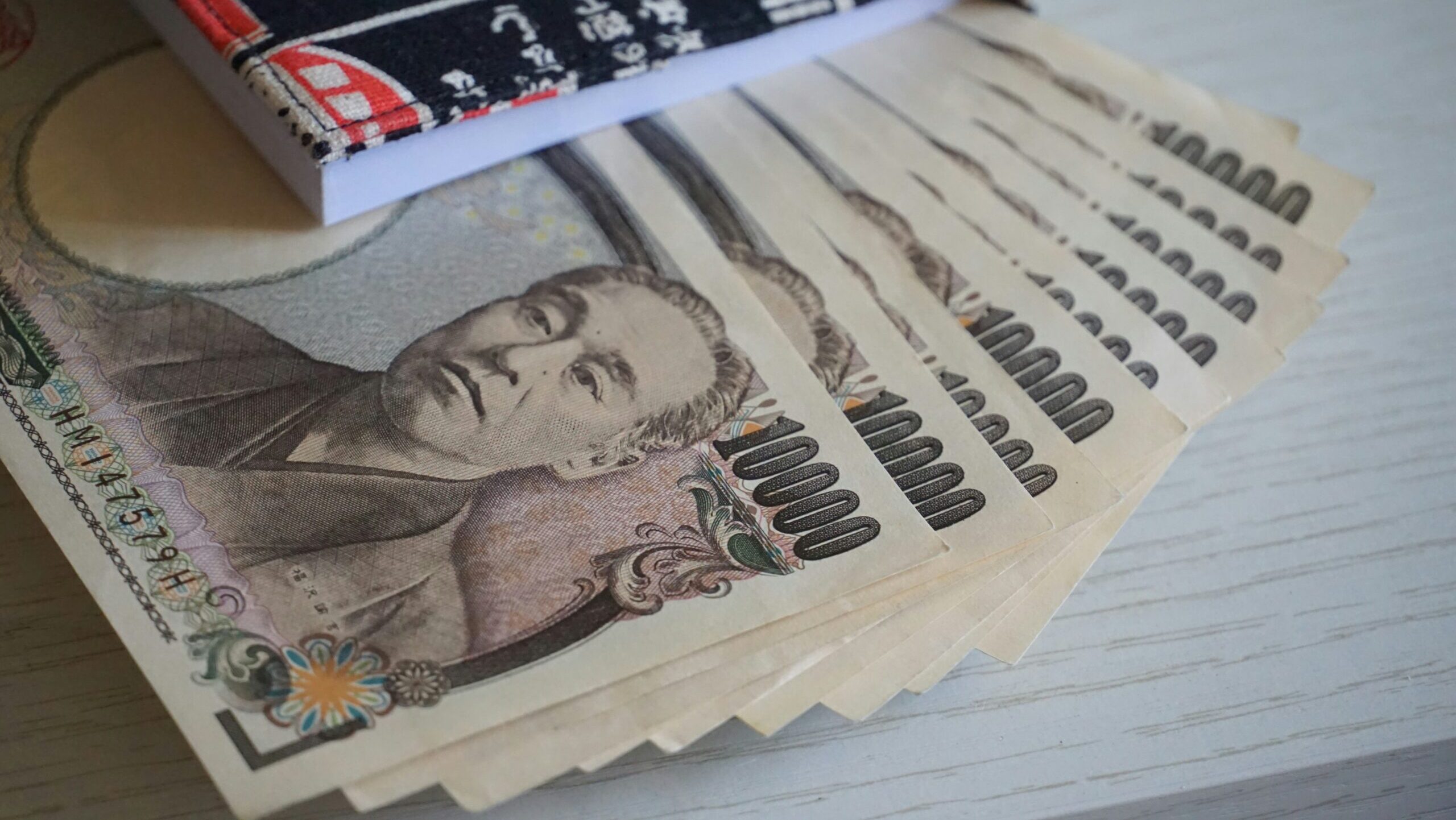 A stack of 10,000 yen notes.