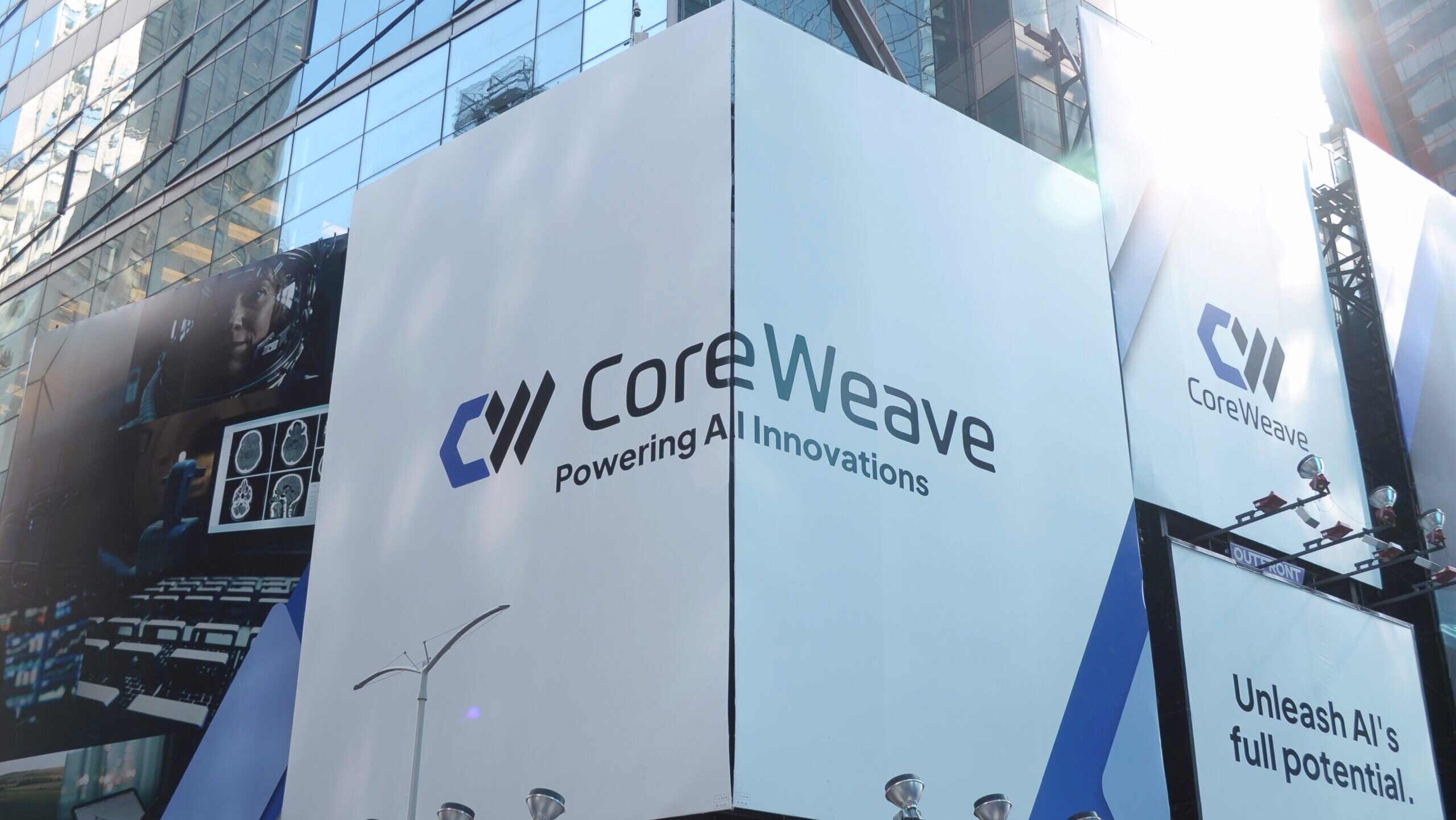 Photo of the CoreWeave logo on display in Times Square.