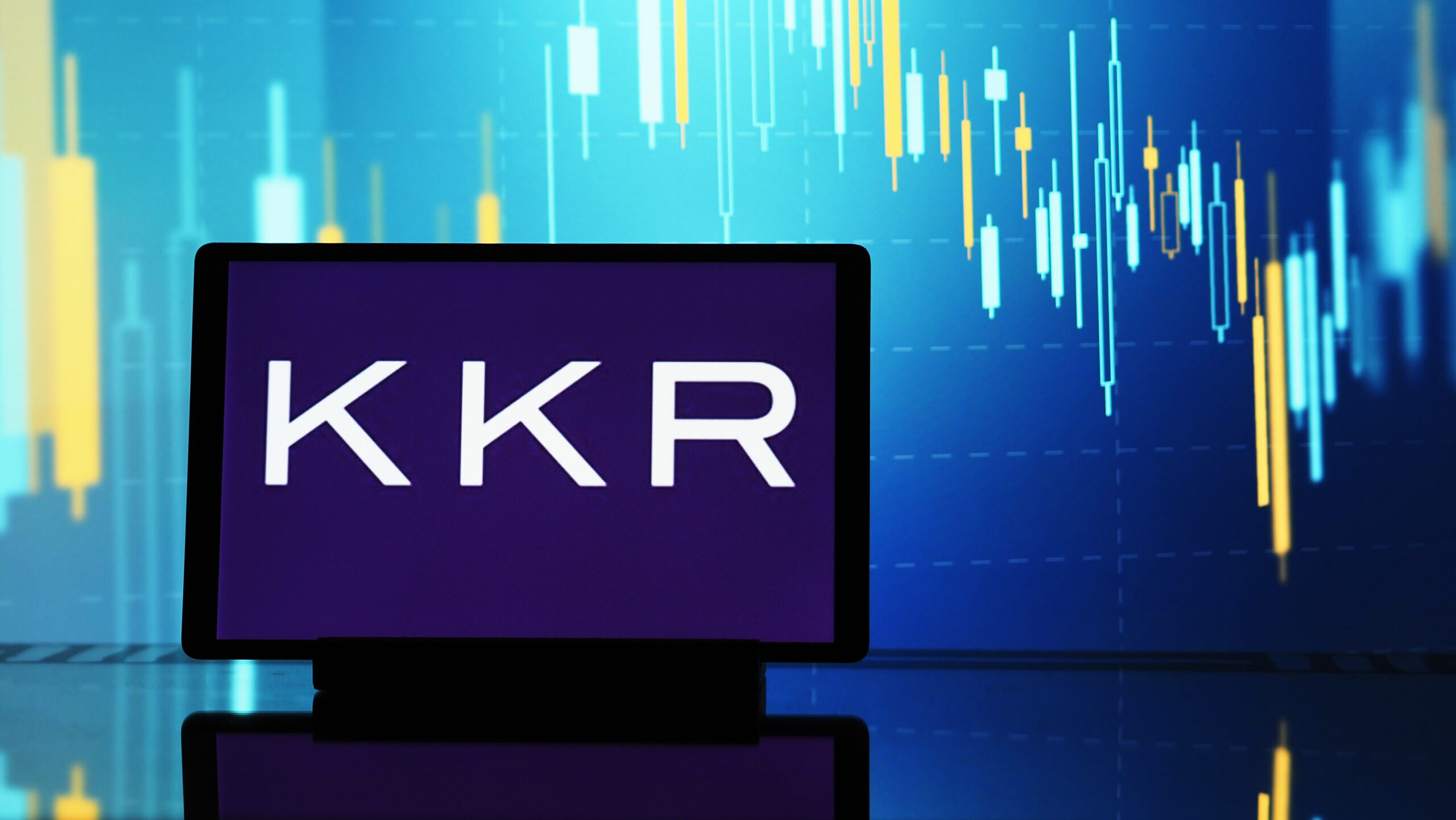 The KKR logo is shown in a tablet screen.