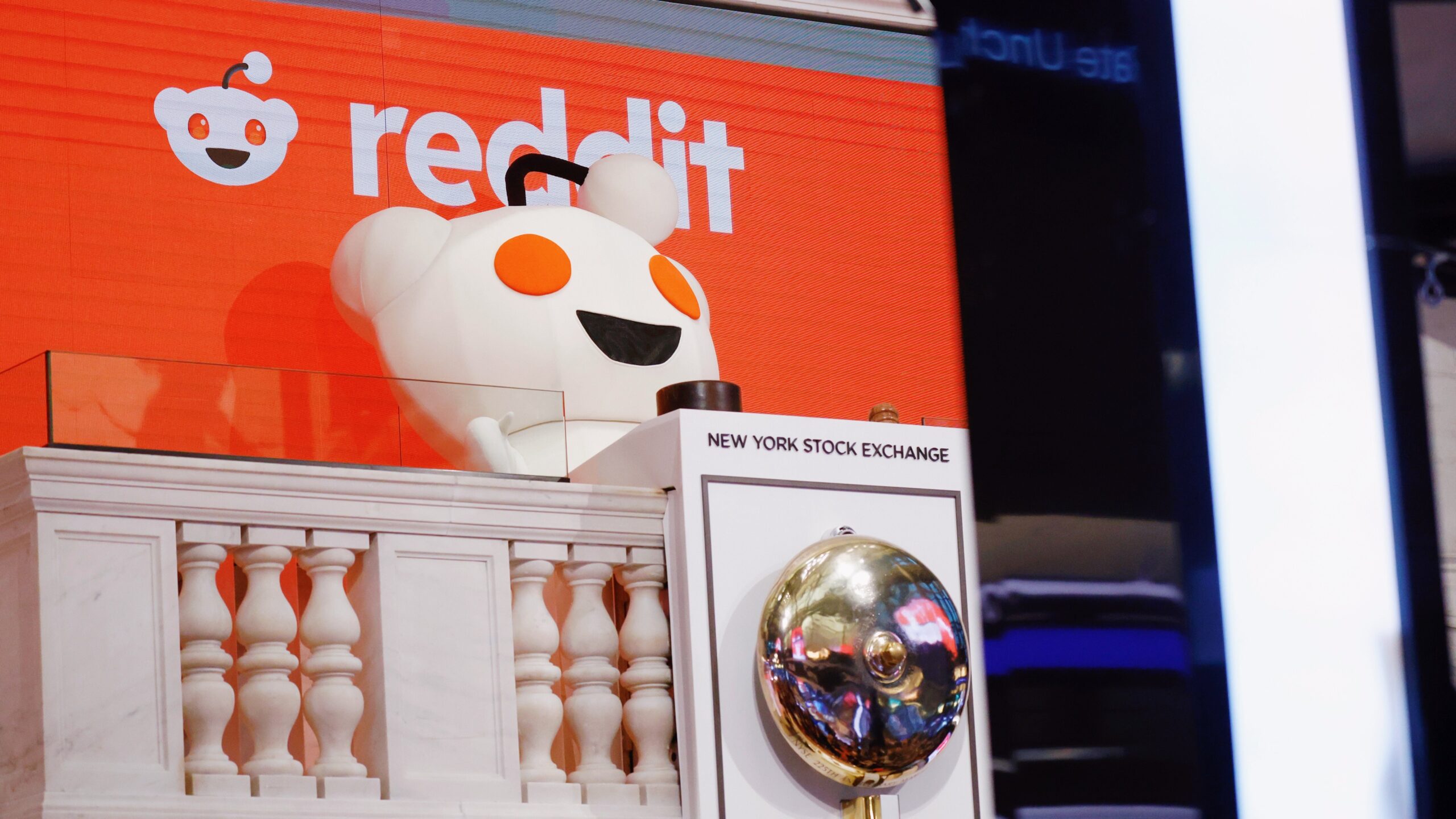 The Reddit Snoo Head rings the New York Stock Exchange (NYSE) on Wall Street in New York City