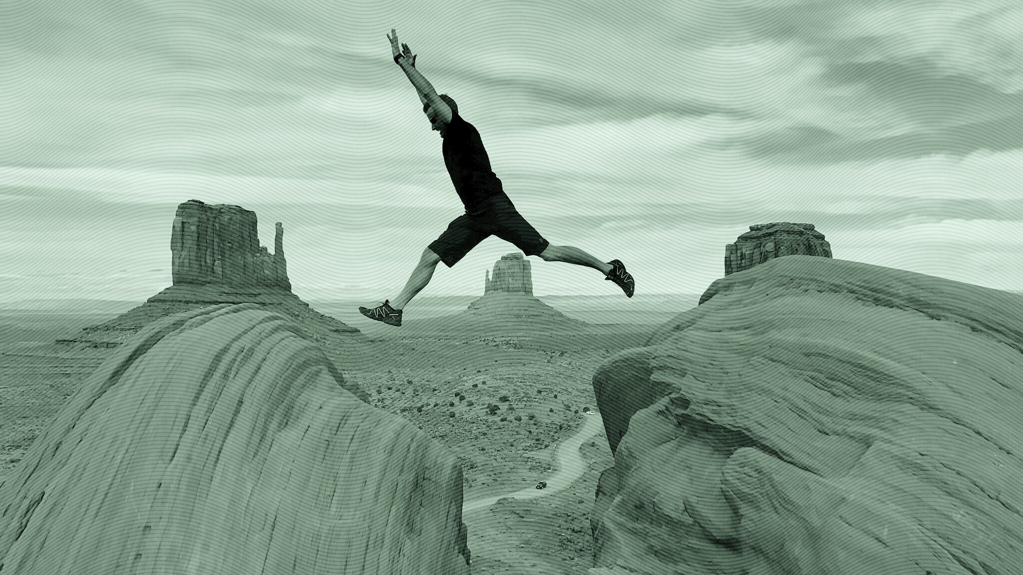 A man jumping over a gap.