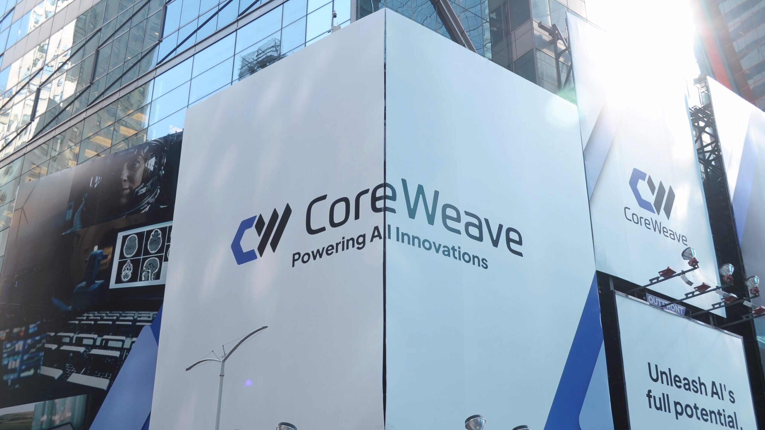 Photo of a billboard advertising CoreWeave.