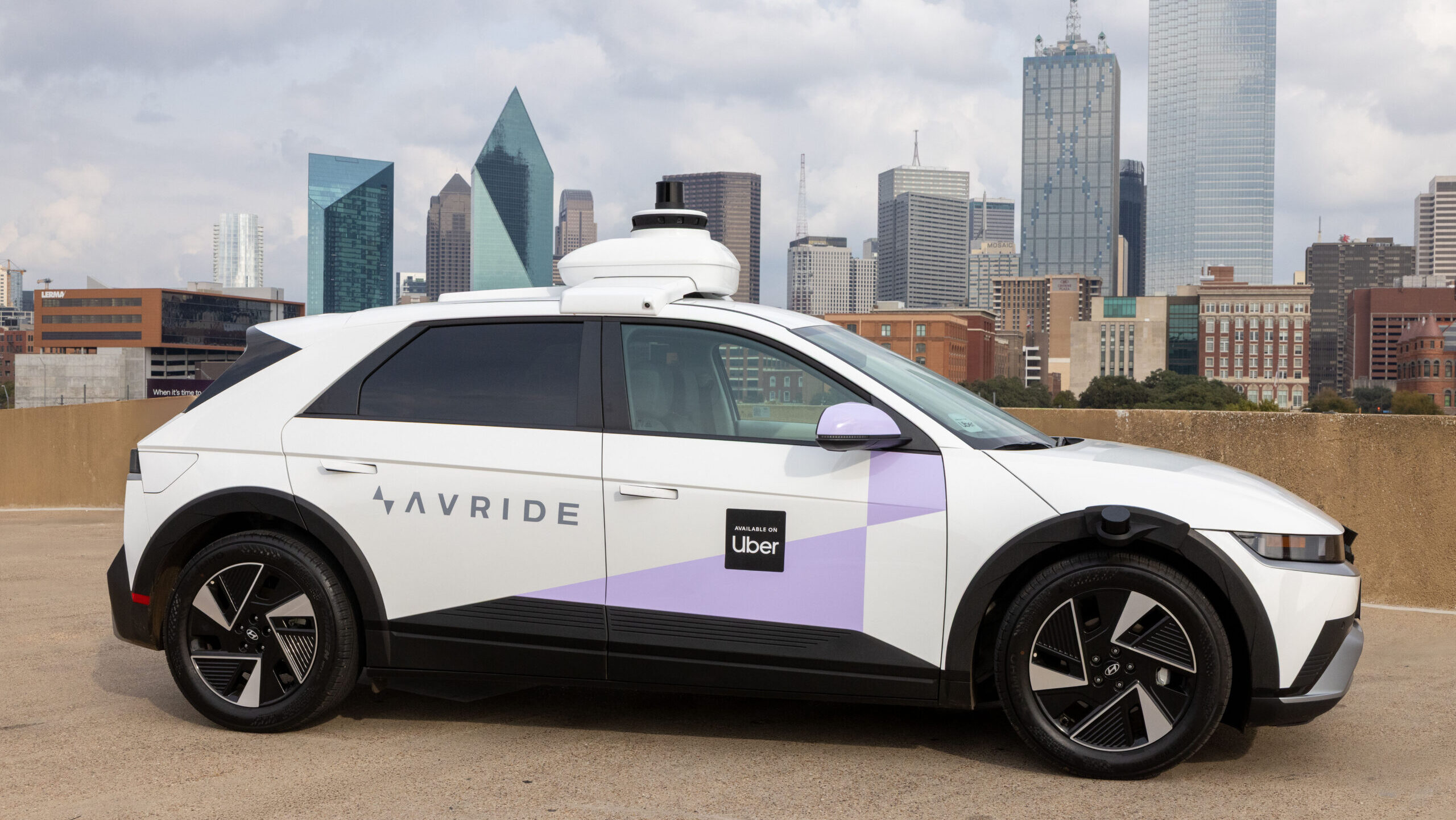 An autonomous Avride robotaxi operating on ride-hailing platform Uber is shown parked in Dallas, Texas.