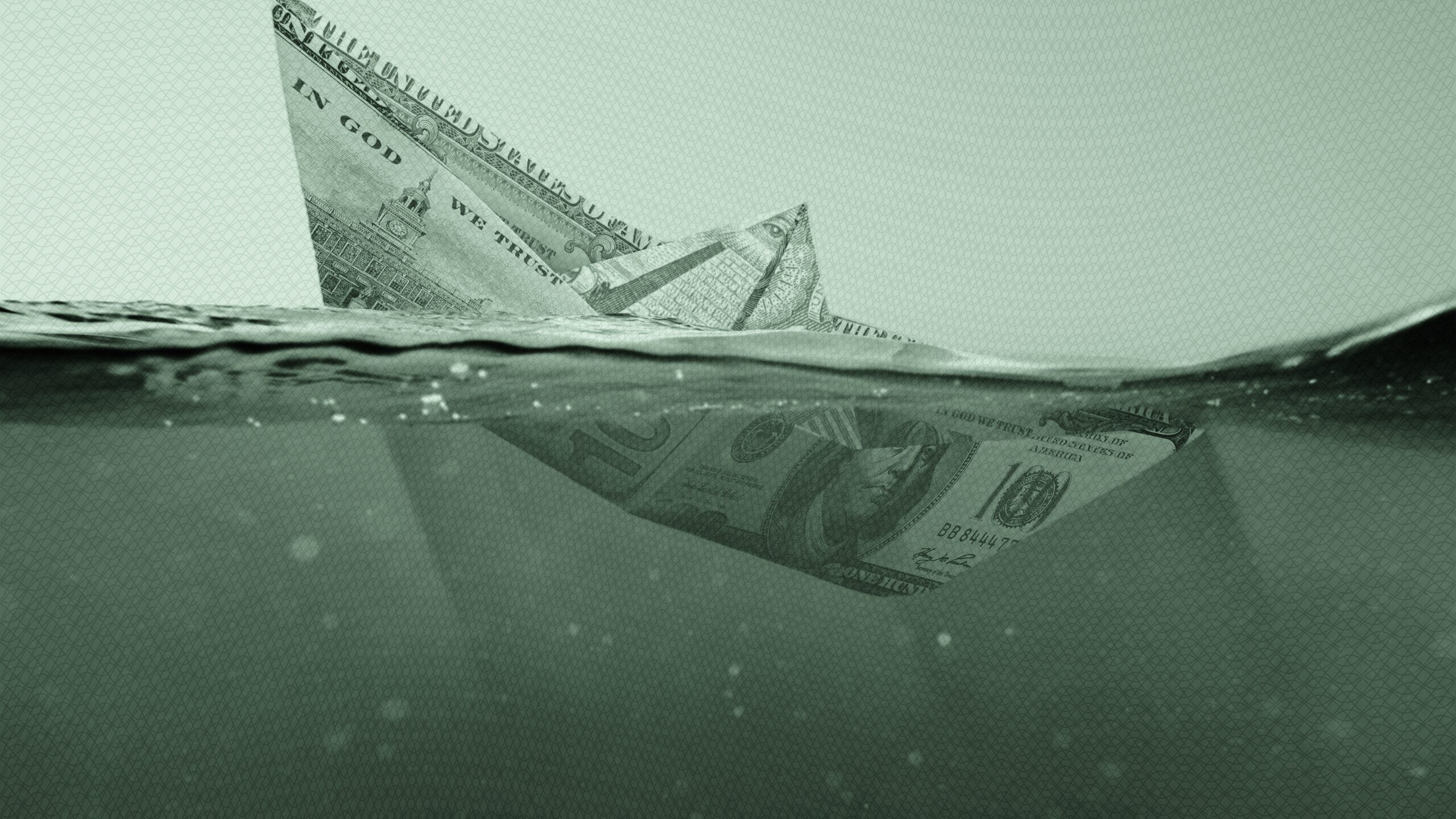 $100 bill made into a boat.