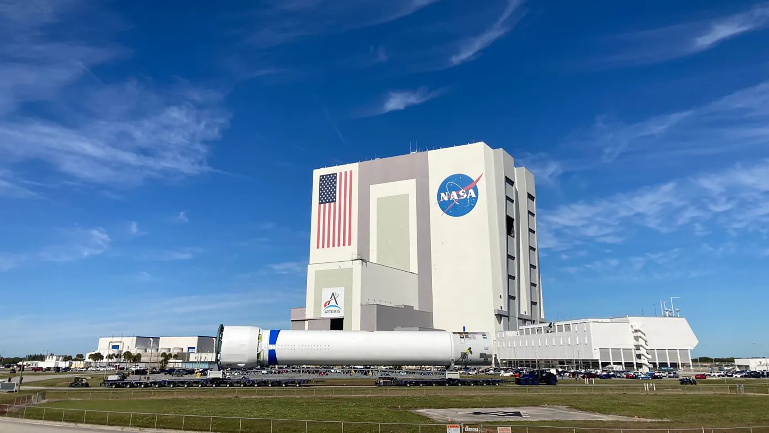 A Blue Origin New Glenn rocket is shown being transported to the vehicle assembly building at Kennedy Space Center in Florida.