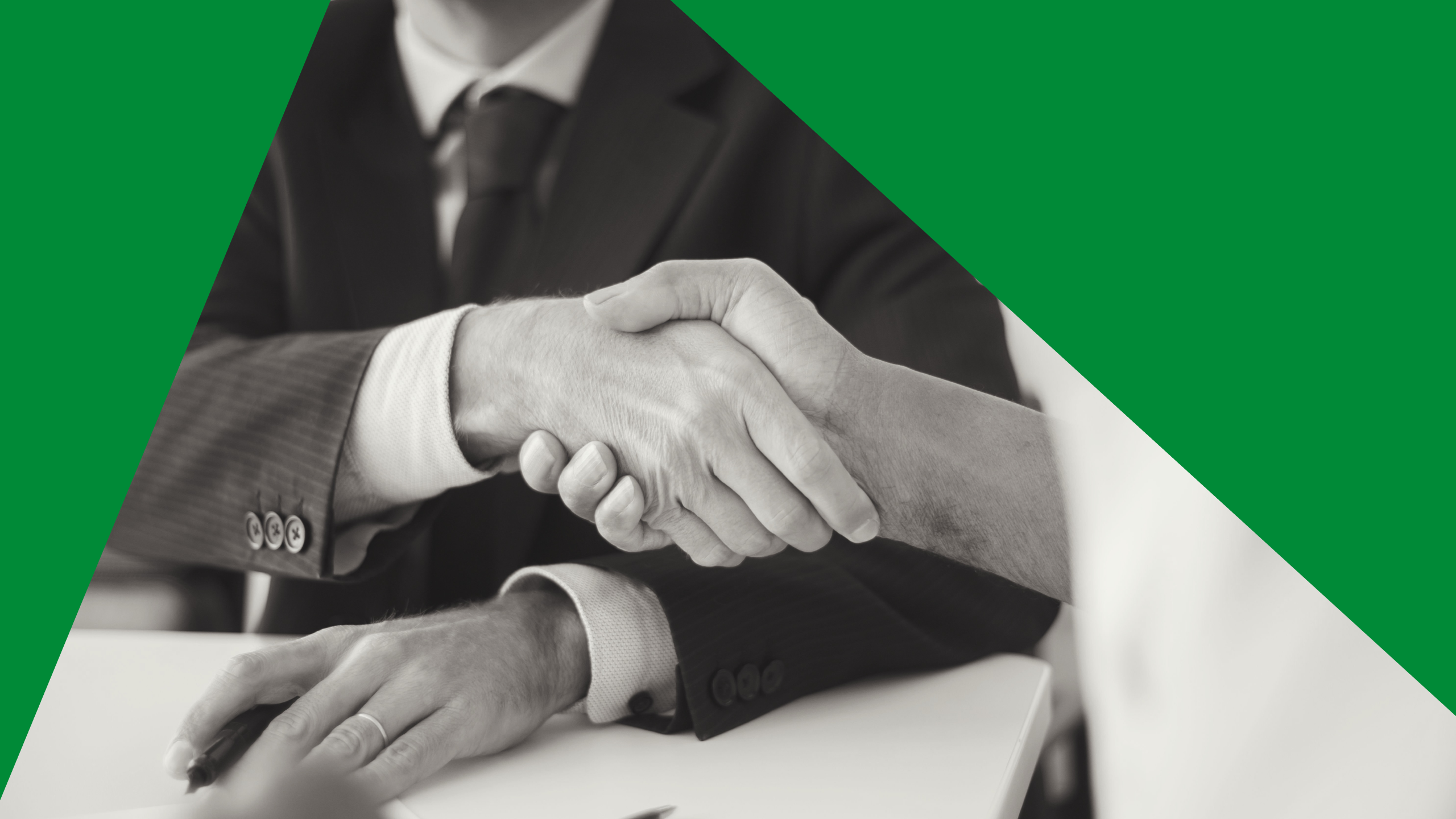 Photo of people shaking hands at a business meeting