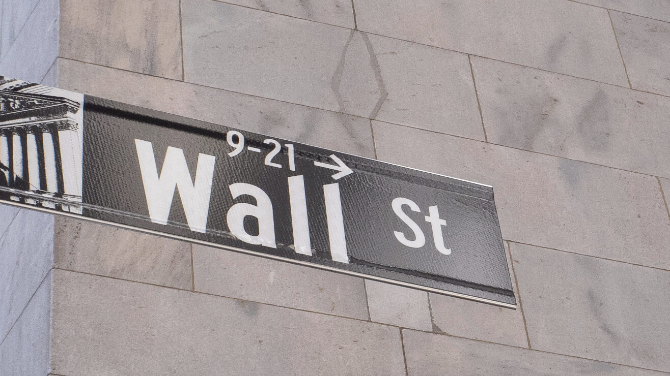 Photo of the Wall Street street sign in New York City.